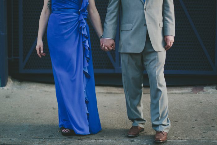 New Orleans wedding photography holding hands royal blue wedding dress