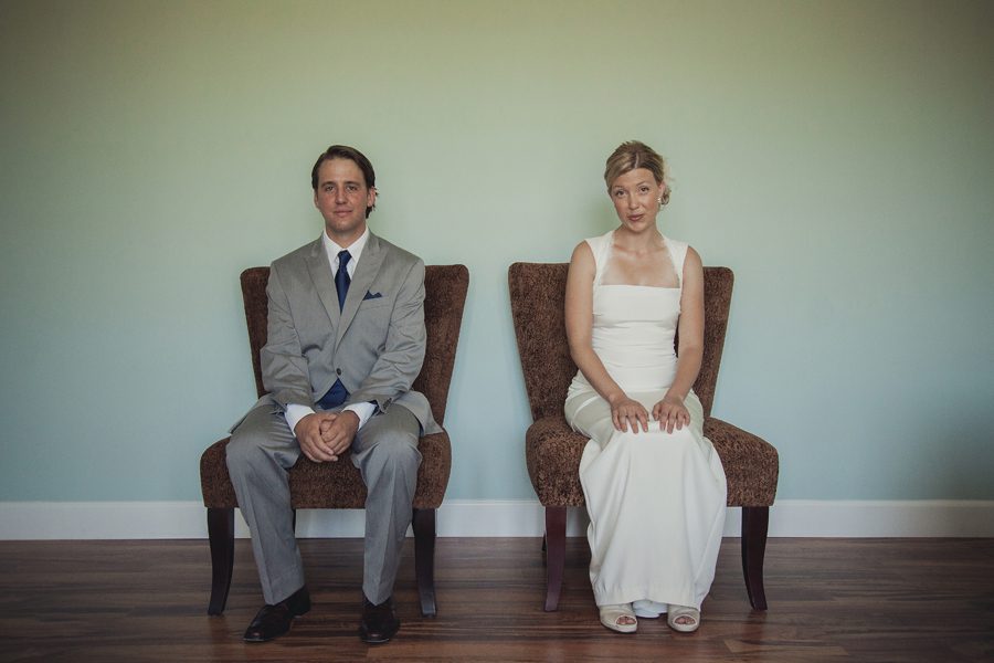 Bride and Groom in chairs wedding portrait