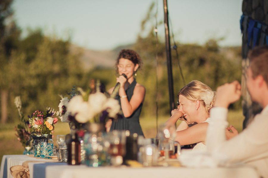 Toasts at outdoor wedding in Oregon