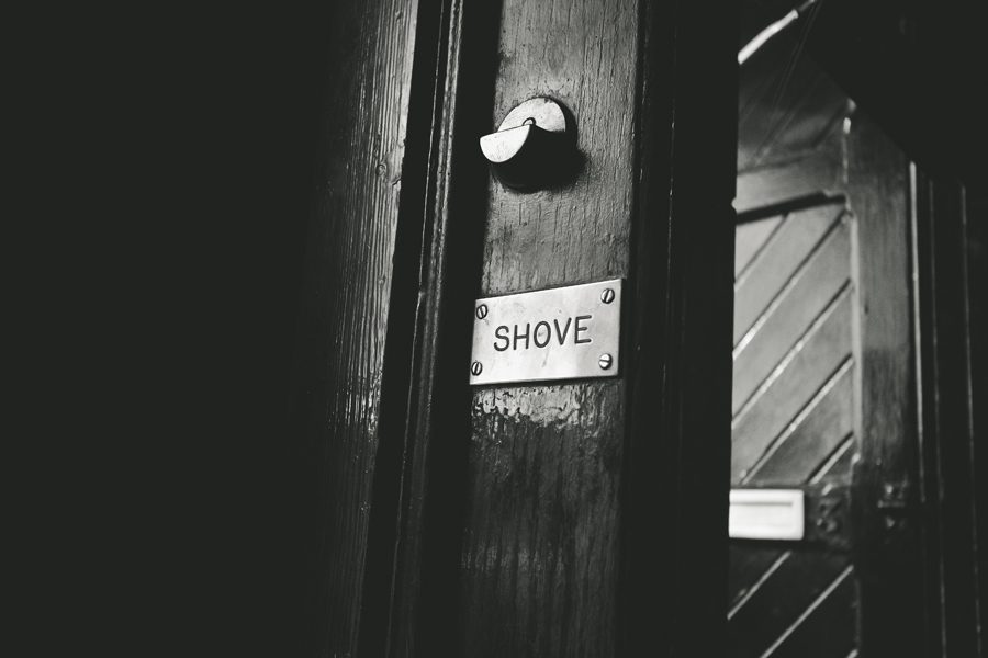 A pub door sign at The Shore Bar in Edinburgh Scotland
