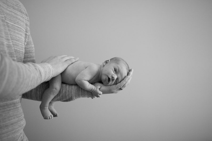 Minnesota newborn portrait | Dad holding baby Jonah