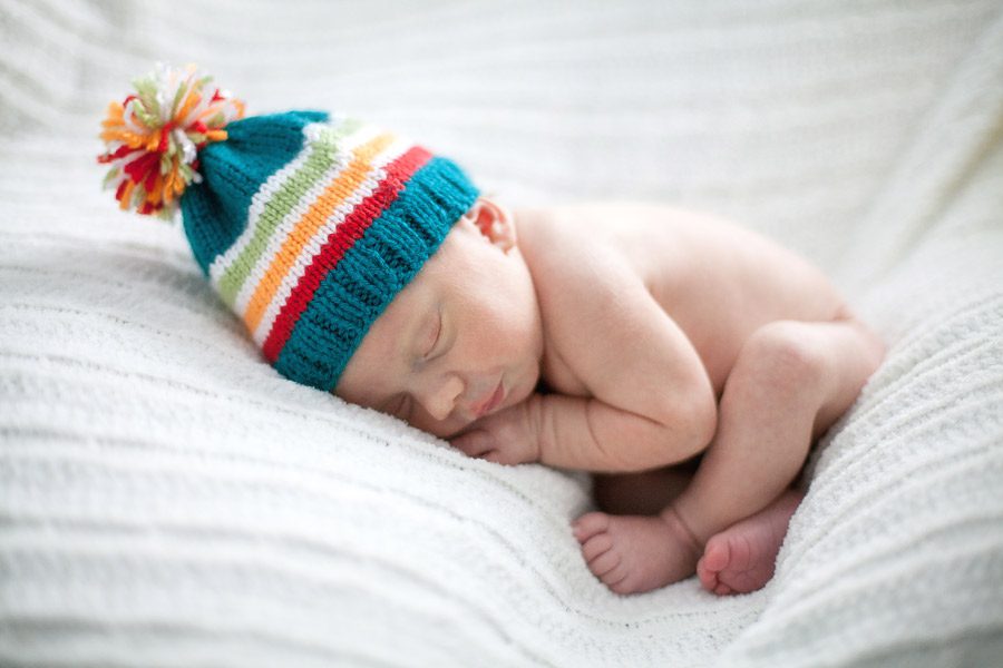Minnesota newborn with colored hat photo