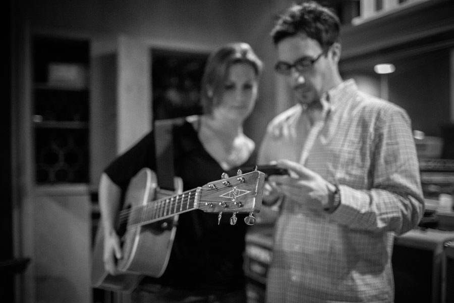 Molly Dean and guitar in studio photo